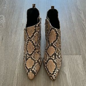 Qupid snakeskin booties with ankle cutout